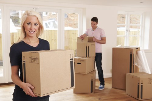 Packed storage boxes and furniture prepared for collection in Notting Hill