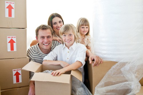 Furniture being moved through a London flat with tight access